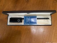 Lighter in open presentation case
