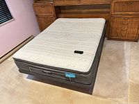 Mattress and adjustable base in flat position
