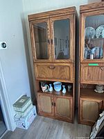 Full view of closed cabinet beside similar unit