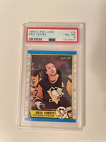 Front view of PSA-slabbed 1989 O-Pee-Chee Paul Coffey #95 card