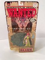 Front view of sealed Blink figure on Marvel's Most Wanted card