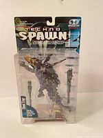 Front view of sealed Techno Spawn Steel Trap figure in packaging