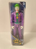 Front view of sealed 12-inch Joker figure in original box