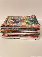 Stack of assorted comic books