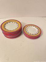 Two stacks of plates showing quantity and size difference