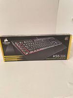 Front view of retail box showing keyboard image and model