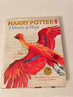 Front cover showing title and phoenix artwork