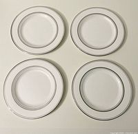 Four plates arranged to show full pattern