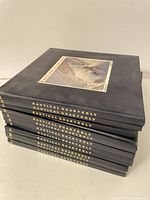 Stack of Nautical Quarterly hardcovers showing front cover example