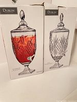 Two boxed Shannon Crystal Dublin Collection beverage dispensers front view