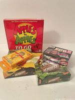 All five sealed game boxes displayed