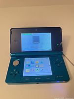 Nintendo 3DS console powered on showing home screen