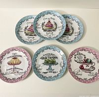 All six plates arranged showing fronts