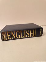Spine view showing title Oxford Reference English and publisher Oxford, gilt lettering