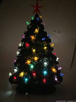 tree illuminated showing working lights