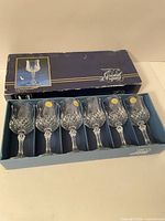Six Longchamp crystal glasses in original box