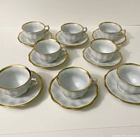 Eight teacups each on its saucer