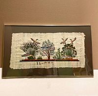 Full view of framed papyrus artwork