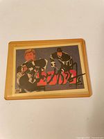 Front view of signed Wayne Gretzky card in sleeve