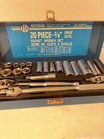 Open blue Westward metal case showing full 20-piece socket set