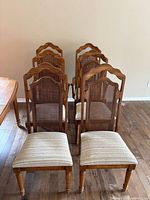Front view of all six oak chairs