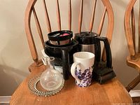 Group shot showing all items balanced on chair