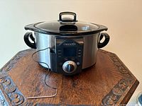 Front view showing stainless steel body, digital control panel, temperature probe connected
