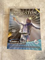 Front cover of the Kingston Yellow Pages directory showing The Tragically Hip image and publication details