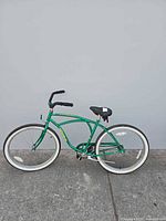 Left side profile of green Ross cruiser bicycle