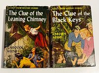 Front dust jackets of both Nancy Drew books