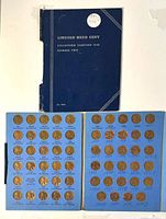 Detached front cover and two filled panels of folder