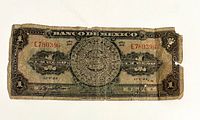 Obverse of 1 peso banknote showing serial E780396, date 12-V-48, series AH, visible wear