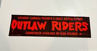 Front view showing full text: 'Anthony Cardoza presents a great motion picture Outlaw Riders soundtrack available on MGM Records'