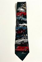 Front view of full tie showing Porsche car print and signature on tip