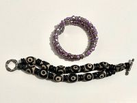 Both bracelets side by side showing overall design and closures
