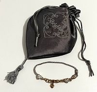Bracelet and embroidered pouch overview