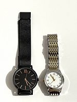 Front view of both watches side by side
