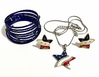 Front view of bracelet, necklace and earrings displaying design and colours