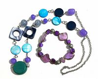 Necklace and bracelet laid out showing bead variety and colors