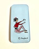 Front of light blue vinyl eyeglass holder with © Ponytail Barbie graphic
