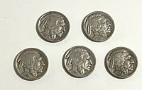 Obverse view of all five nickels, years visible 1934-1937