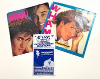 Front view of both record sleeves and 1985 BASS Tickets guide