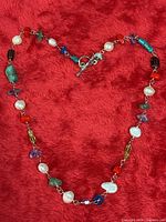 Full view of necklace displaying bead arrangement and overall condition