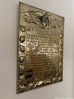 Plaque featuring The 23rd Psalm of David, gold-tone embossed metal with shepherd scene
