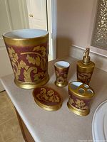 Full view of all five bathroom accessories showing design, color and condition