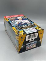 Rear-side view showing shrink wrap, barcode, Series One branding
