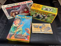 Front view of all four boxed games