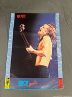Full view of poster front showing image, calendar, logos and coupons