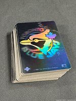 Stack of Blue Jays hologram cards showing foil logo and card edges