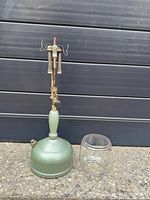Lantern base with burner assembly and separate globe